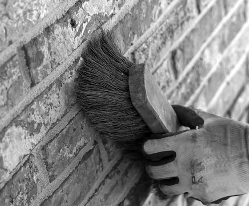 Brushing down after repointing